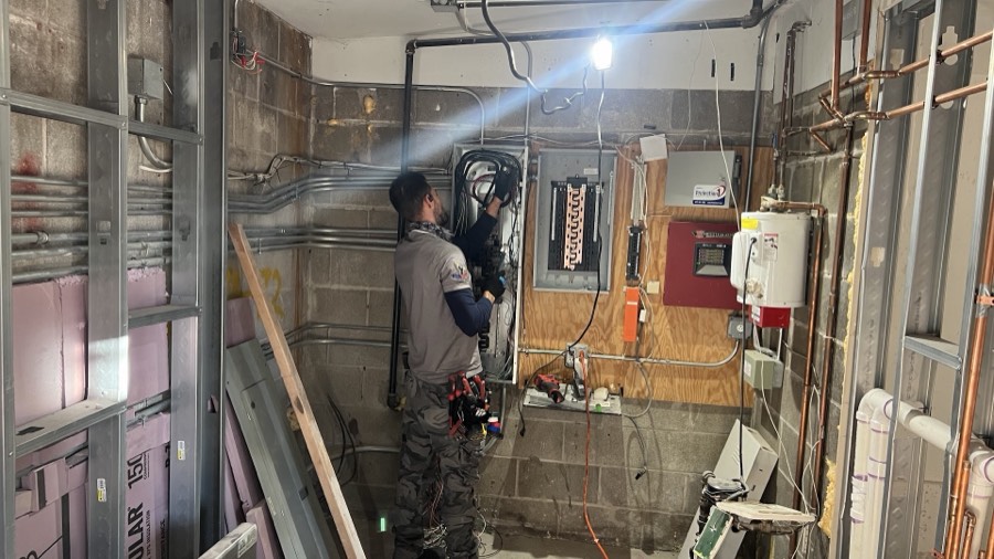 Rescue Electric technician restoring power at a commercial electrical service